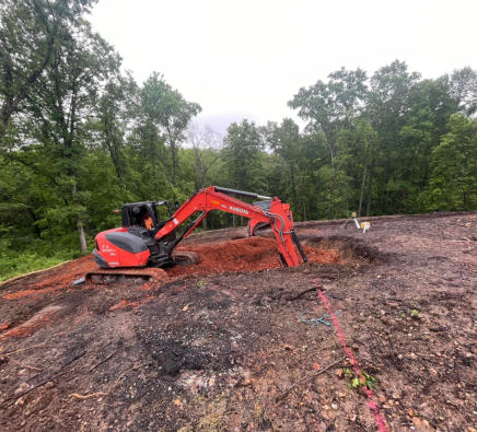 Excavation service for the Rogers area. We do footings, lot clearing, underground electric and water lines, demolition and prep for septic lines.